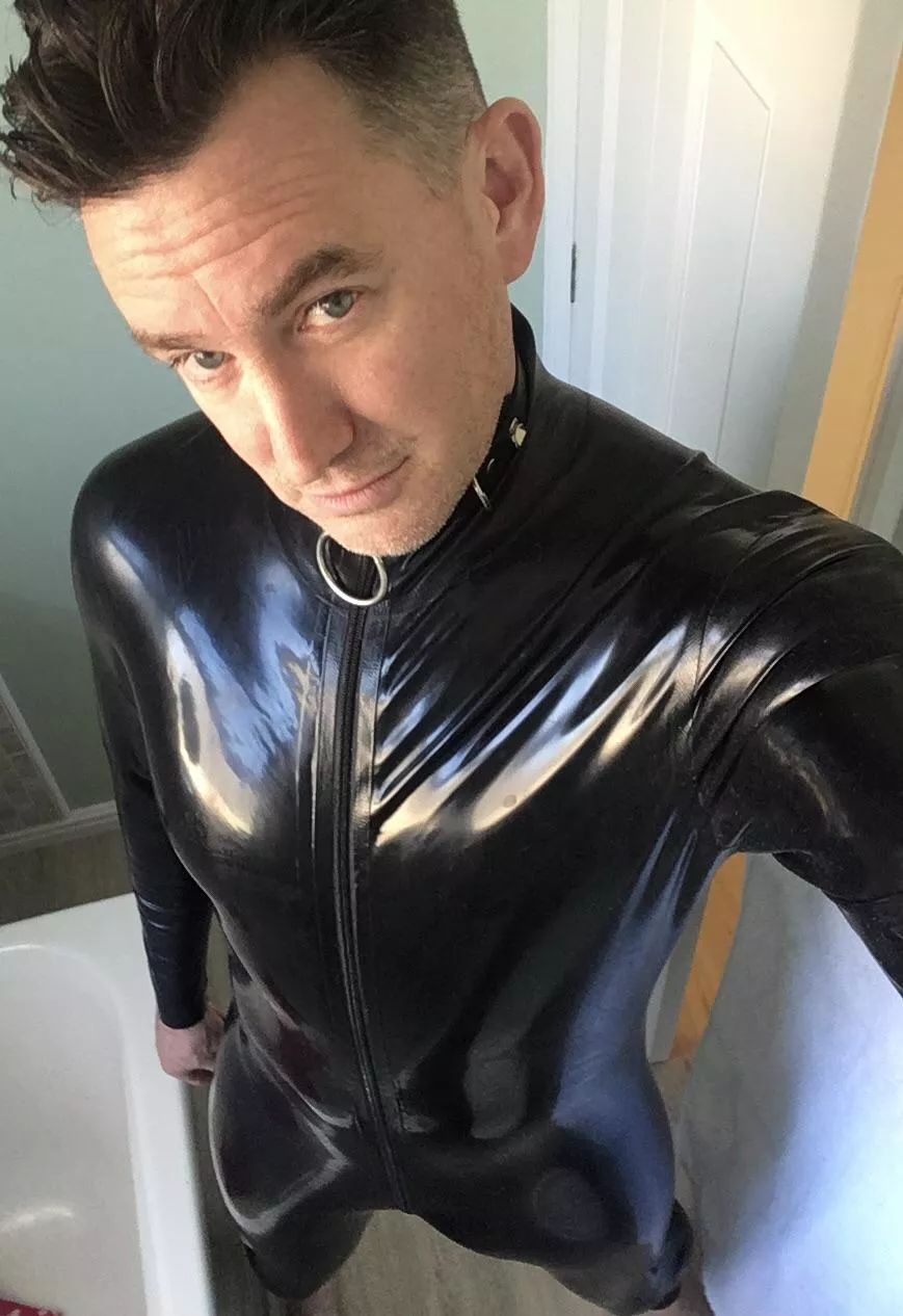 Only thing better than wearing shiny black latex is serving you.
