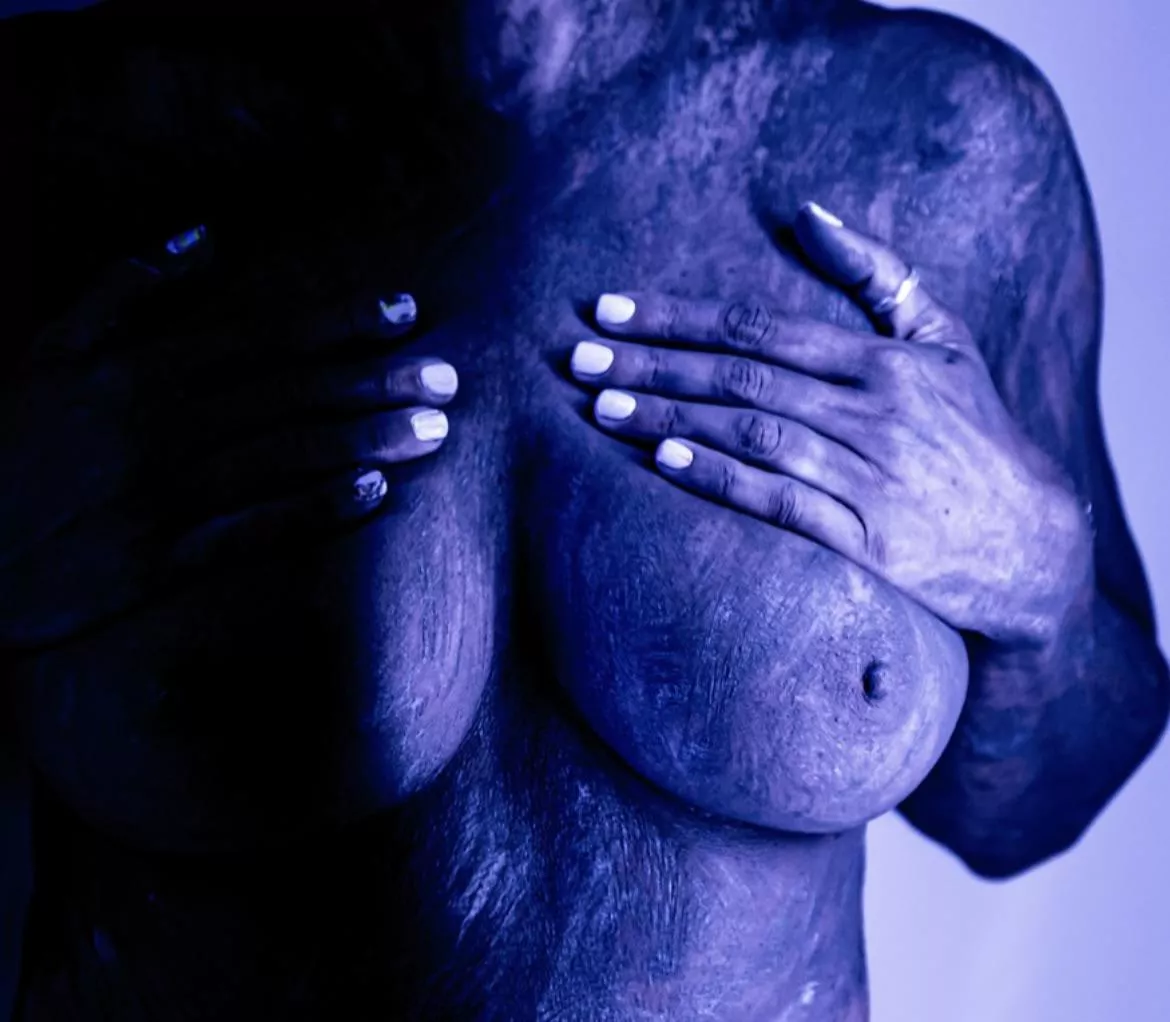 Wife[F43]enjoyed letting the professional photographer put the clay on her