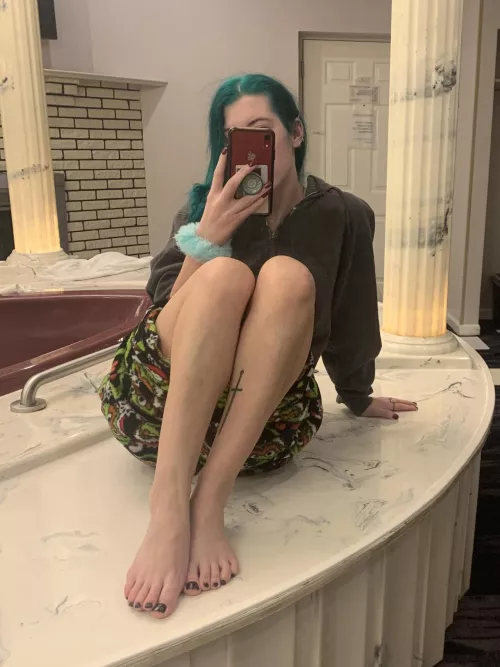 Feet about to get dipped in the tub