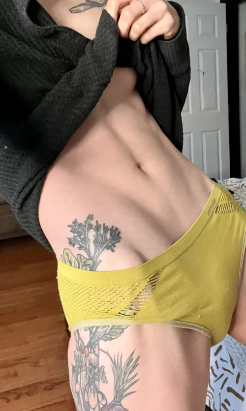 A close up of my hipbone & toned tummy