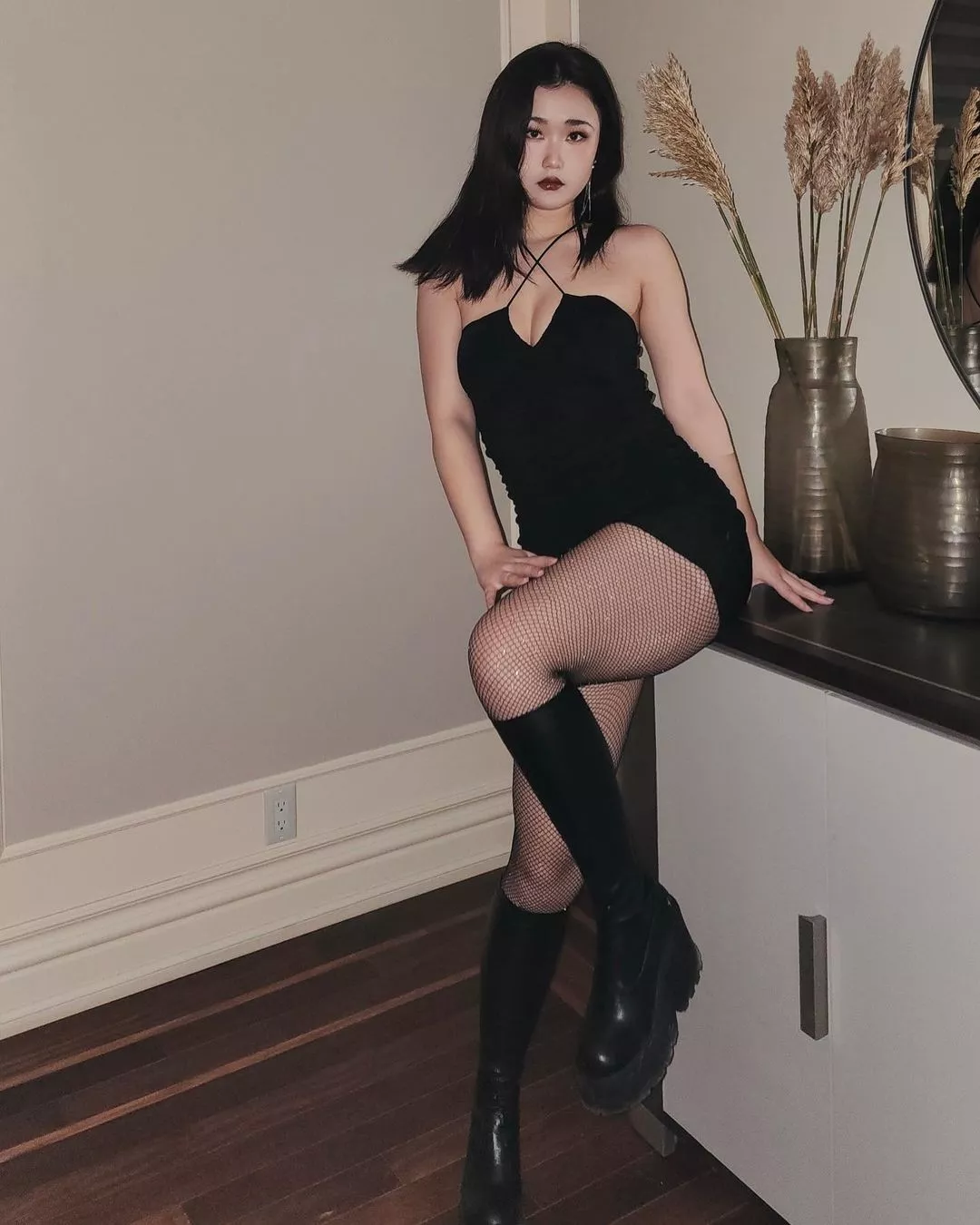 Fishnets and a black dress