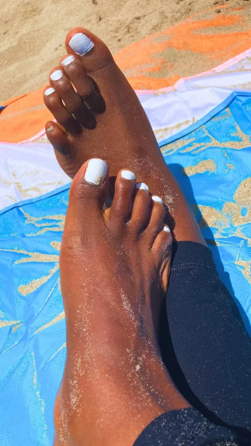 help me clean off all this sand?