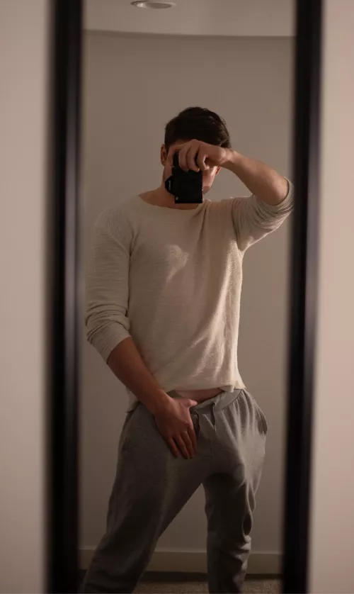 My big grey sweatpant bulge