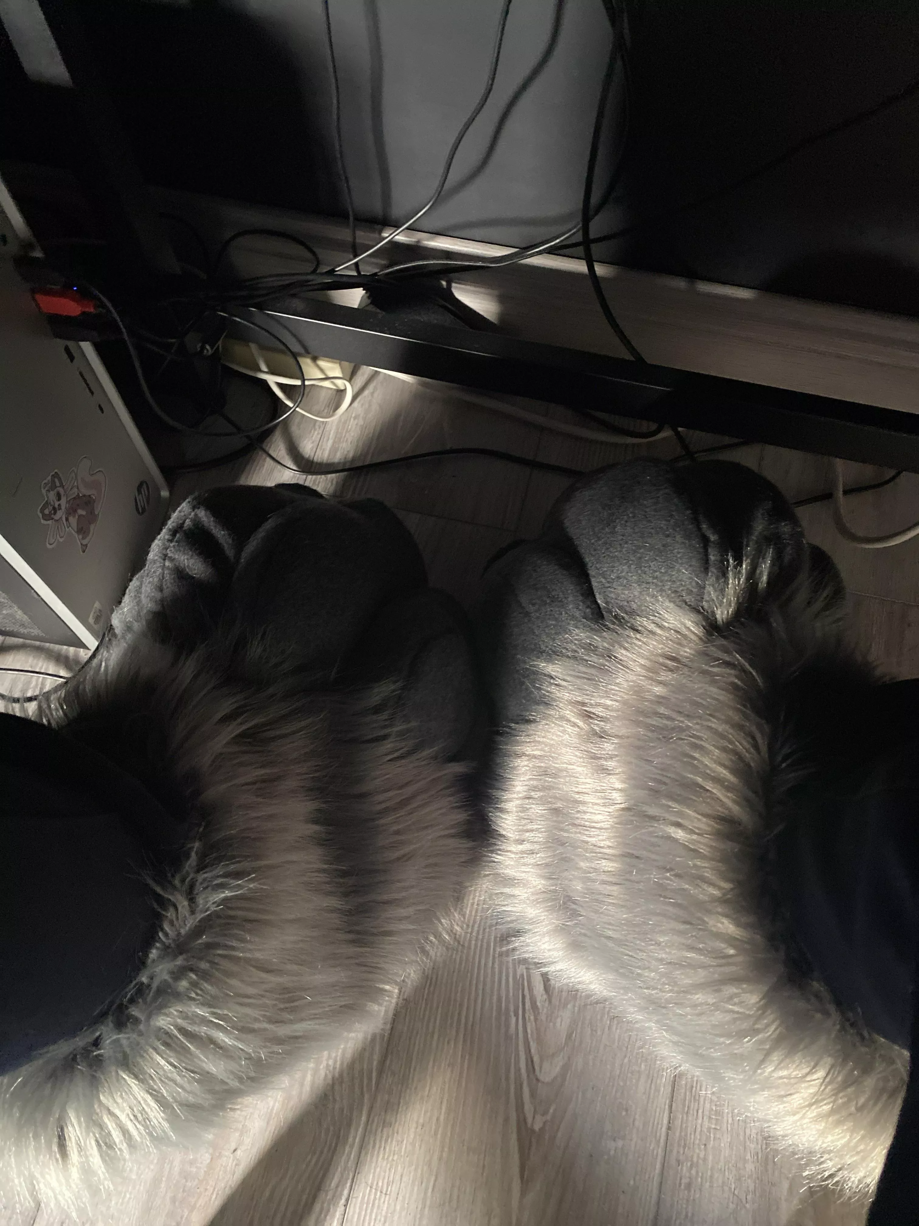 My fursuit is here, but the feetpaws are too big. What can I do to secure them on my foot better?