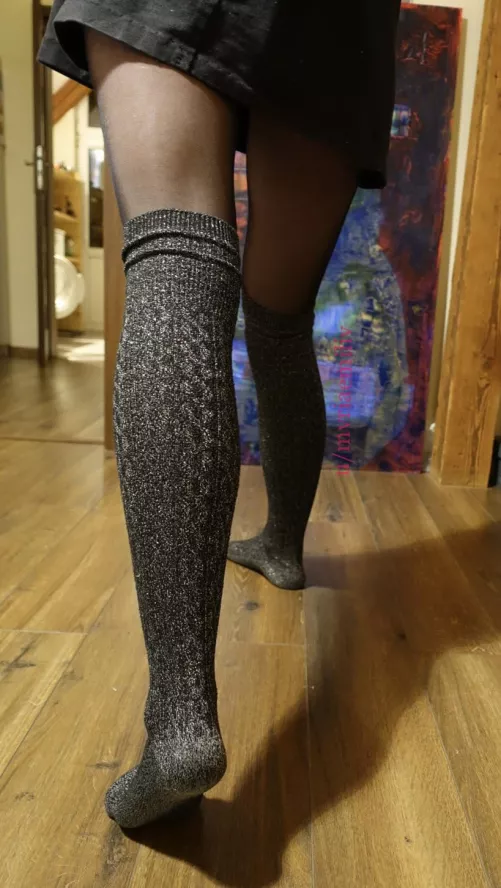 Silver knee socks, black nylons, black mini dress