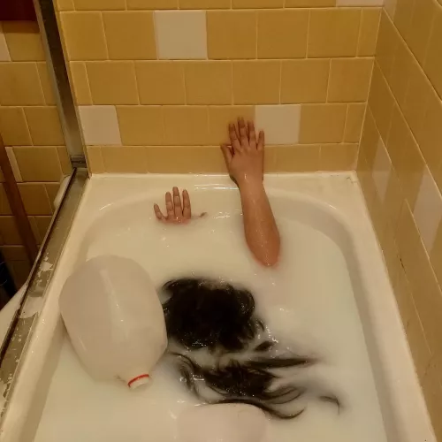 slipping into a milk bath