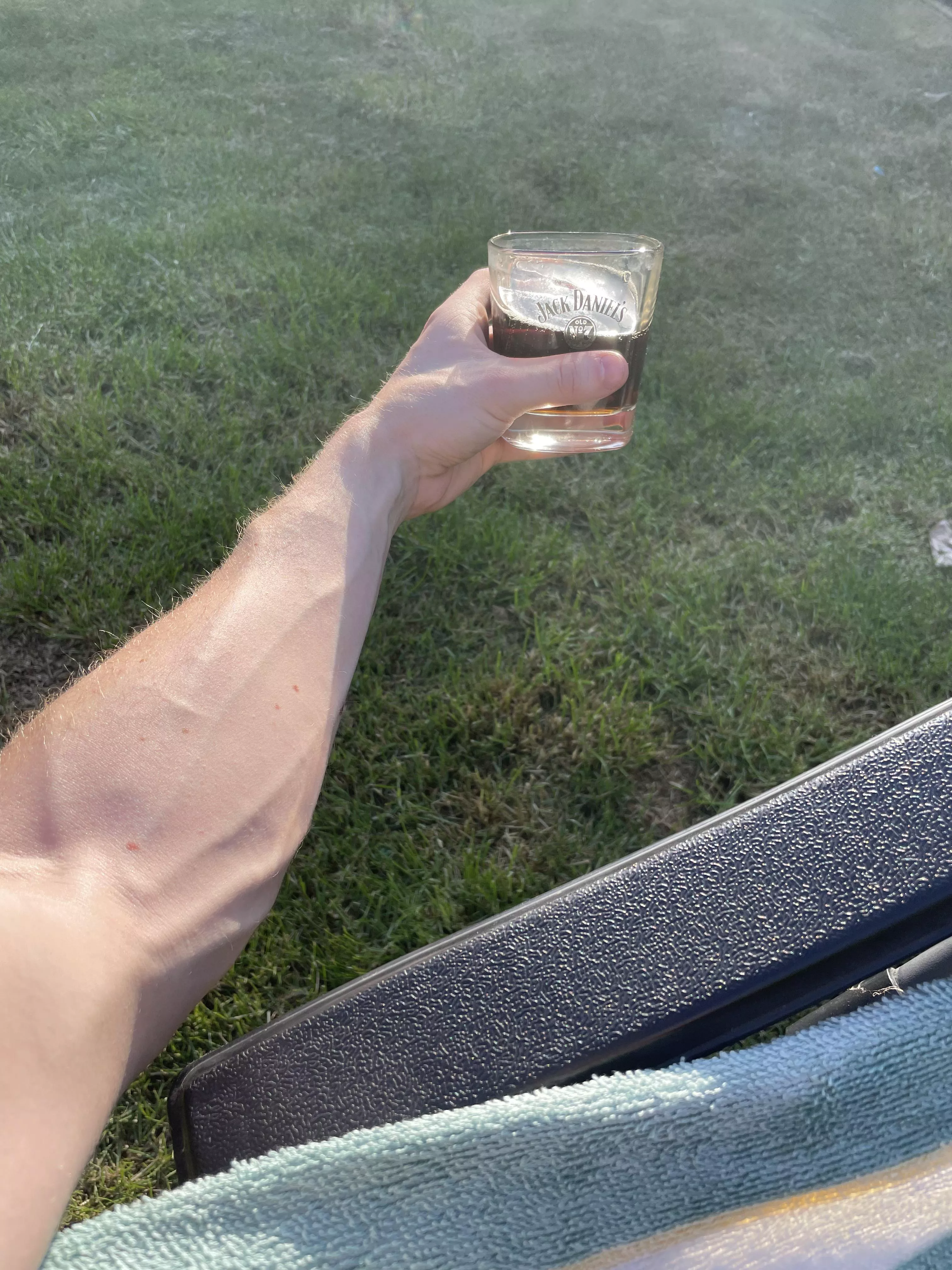 Enjoying a whiskey in the warm sun after a hard days work.