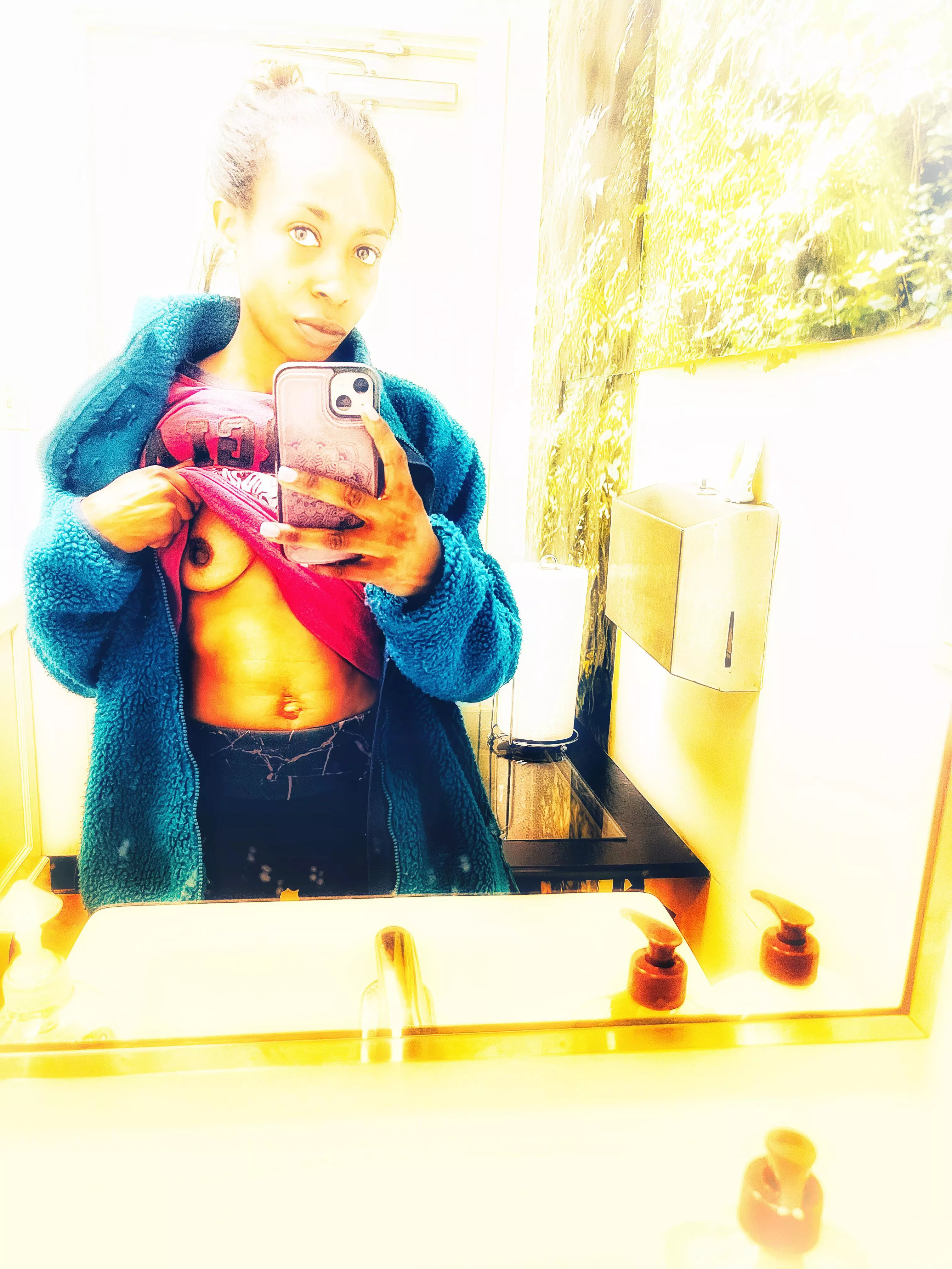 [Mrs] in the public bathroom and realized I “forgot” my bra. Do you think I “forgot” my panties too 😏