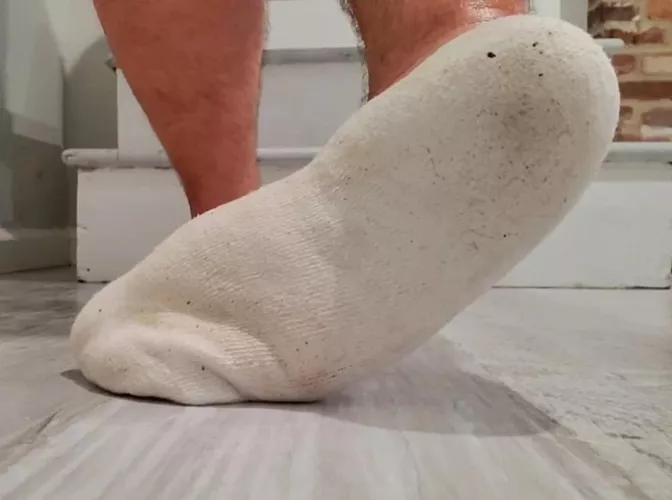 My sweaty, socked sole