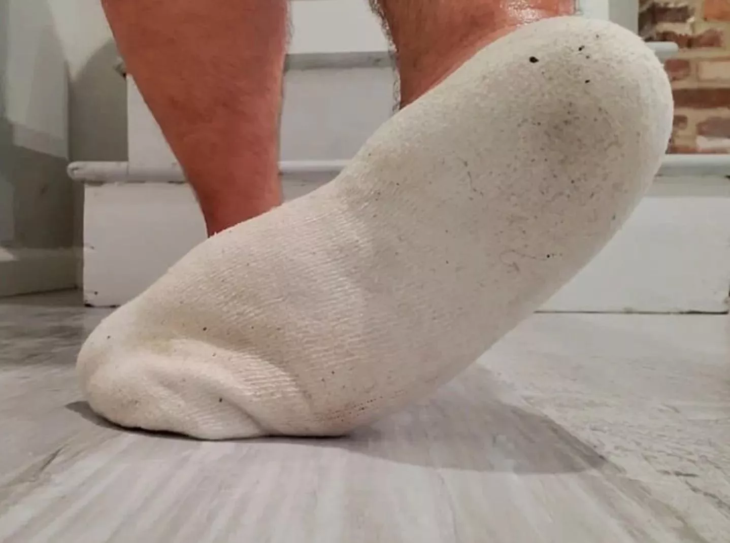 My sweaty, socked sole
