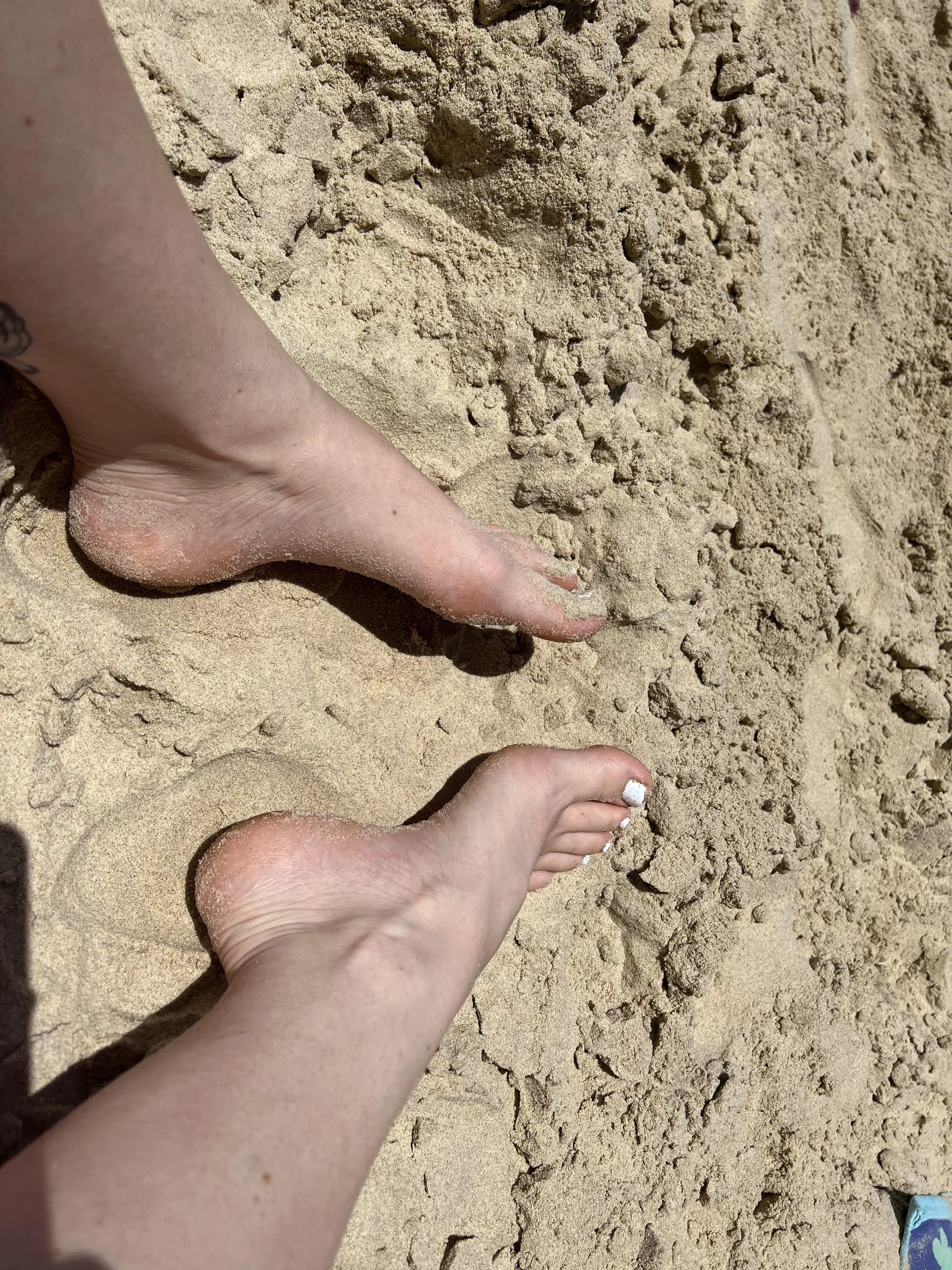 sandy beach feet
