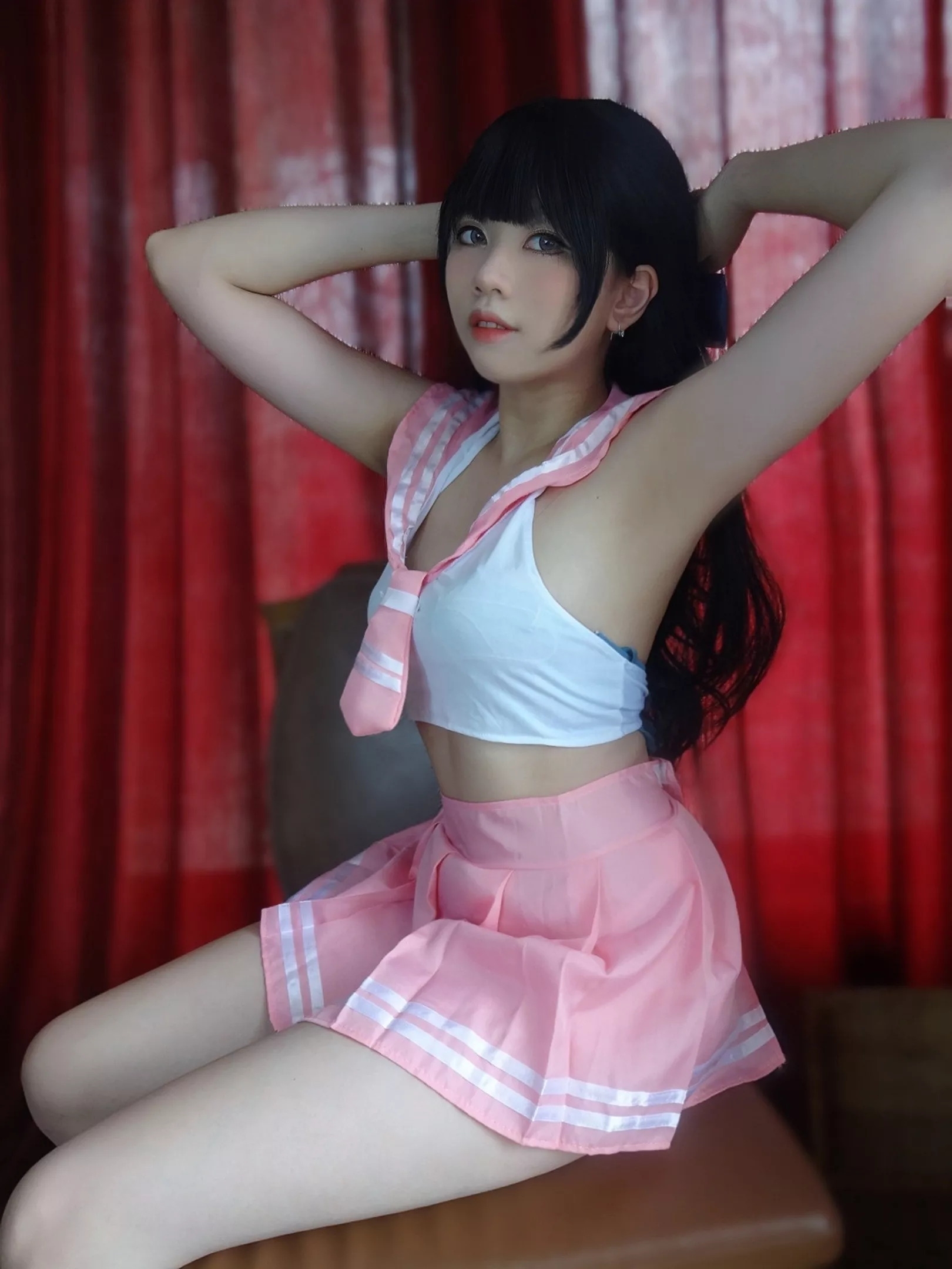19 yo girl in cute pink sailor costume
