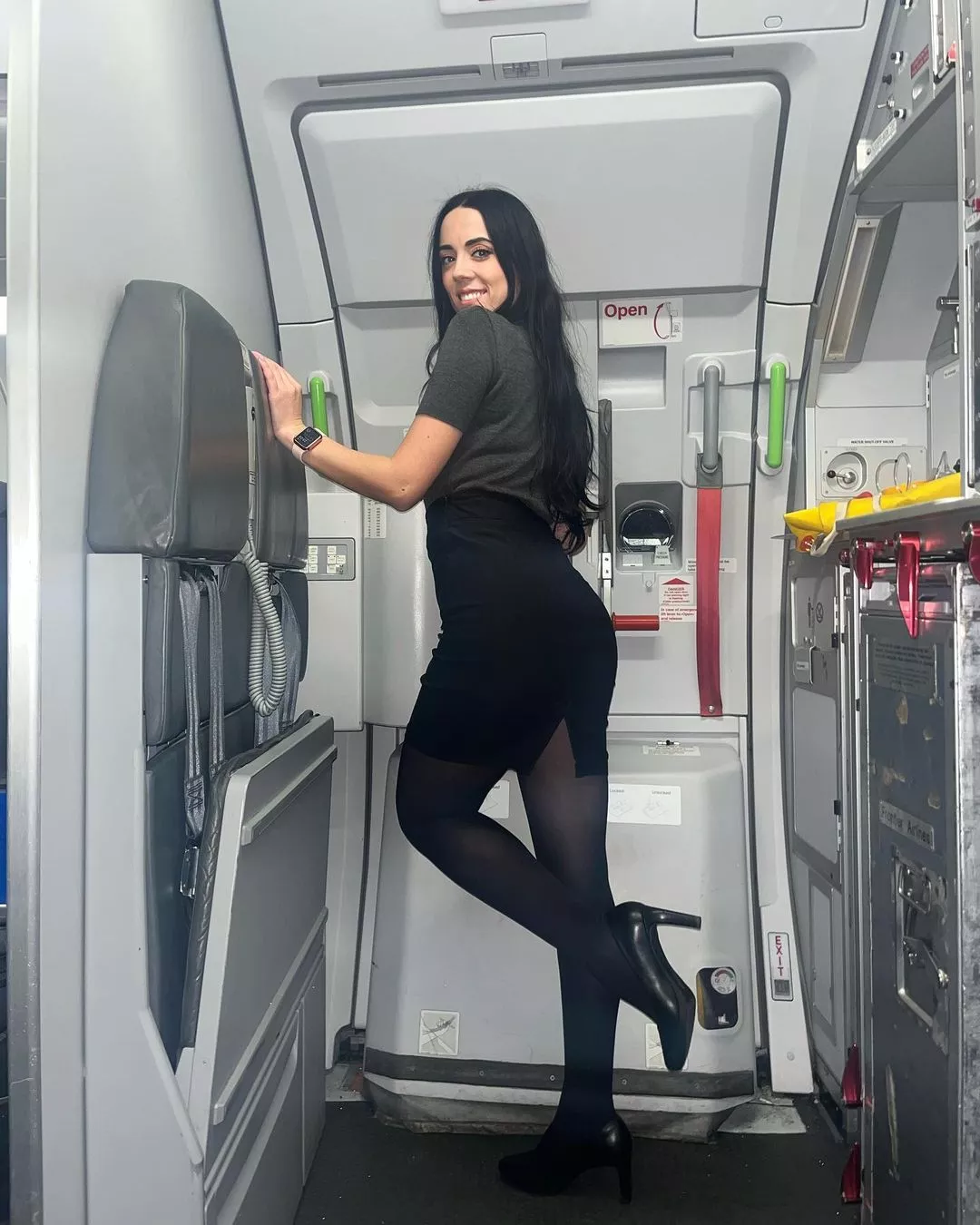 Flight attendant in black
