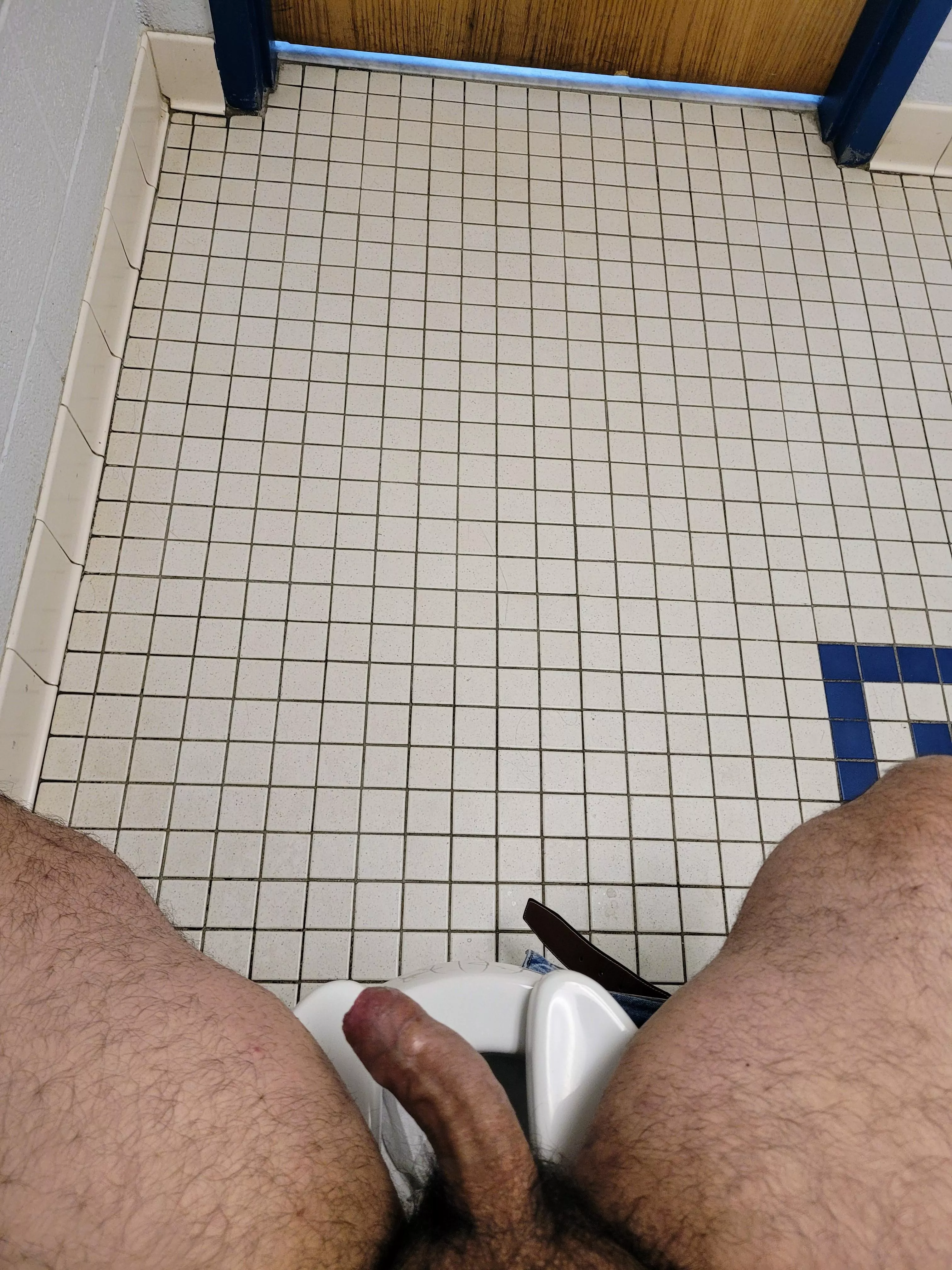 Horny high school teacher hiding out in the bathroom