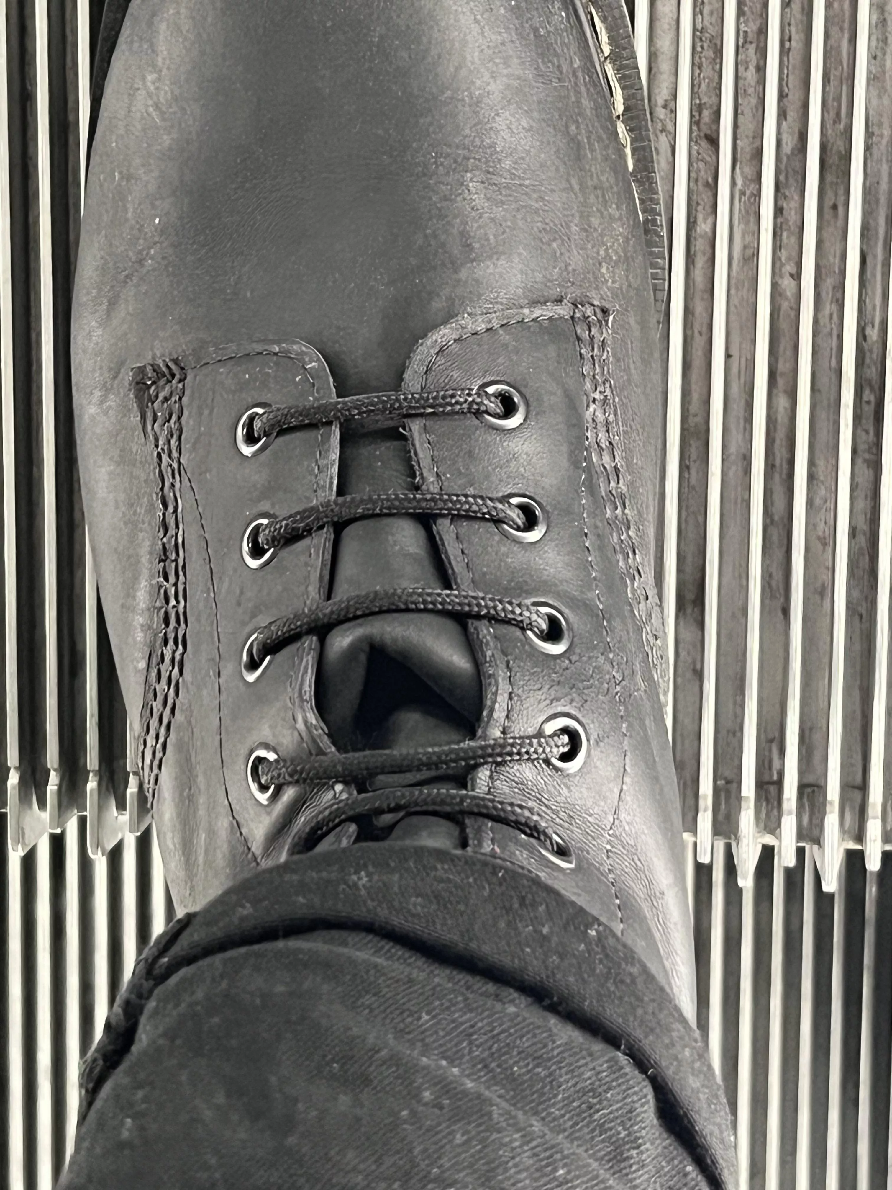 How do I stop the tongue on my boots folding like this?