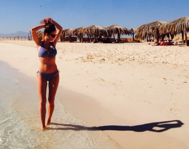 polka dot bikini checking out shadow