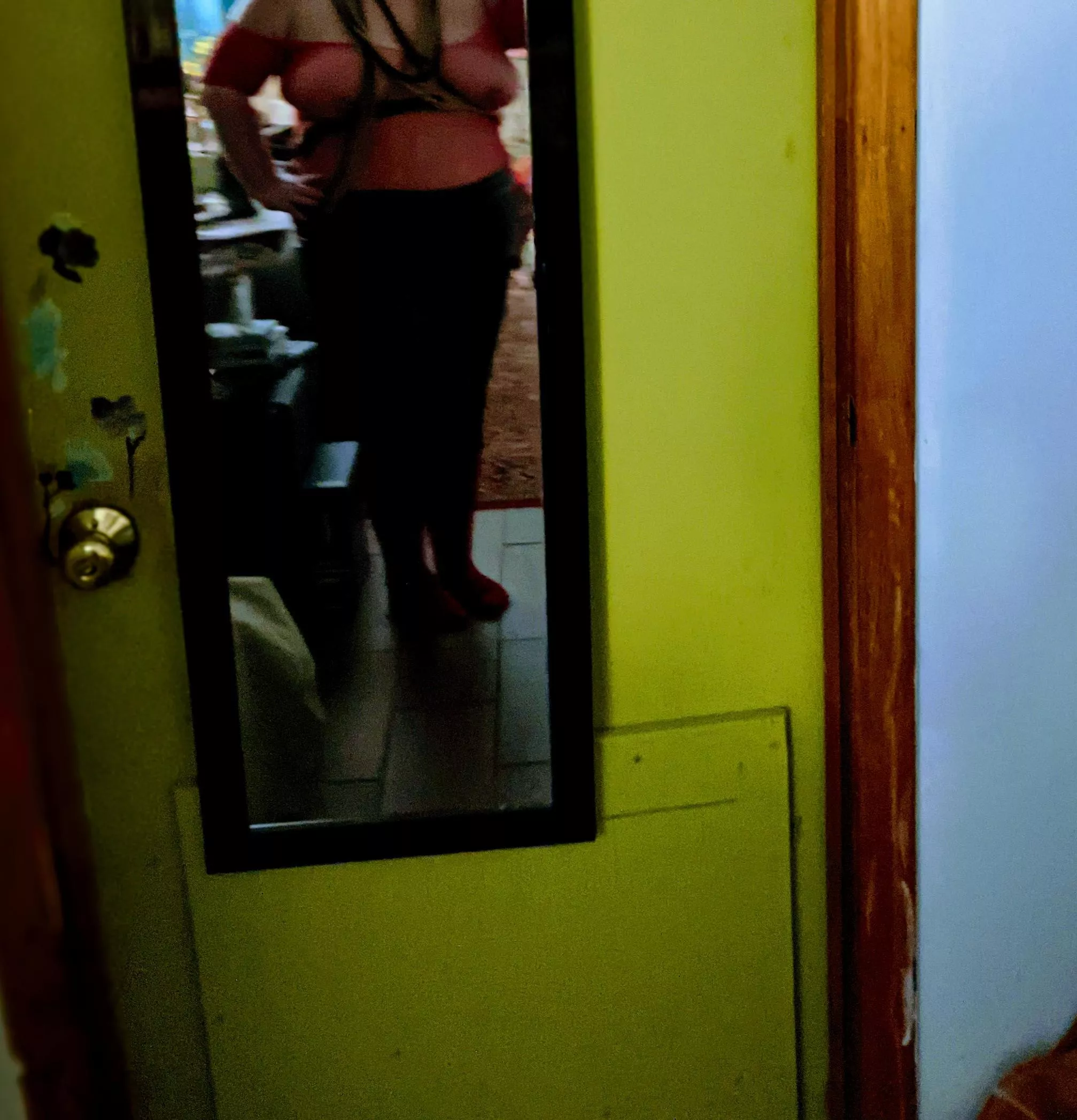 A red fishnet body stocking, double ropes, and a wiggle skirt make for a fun time.