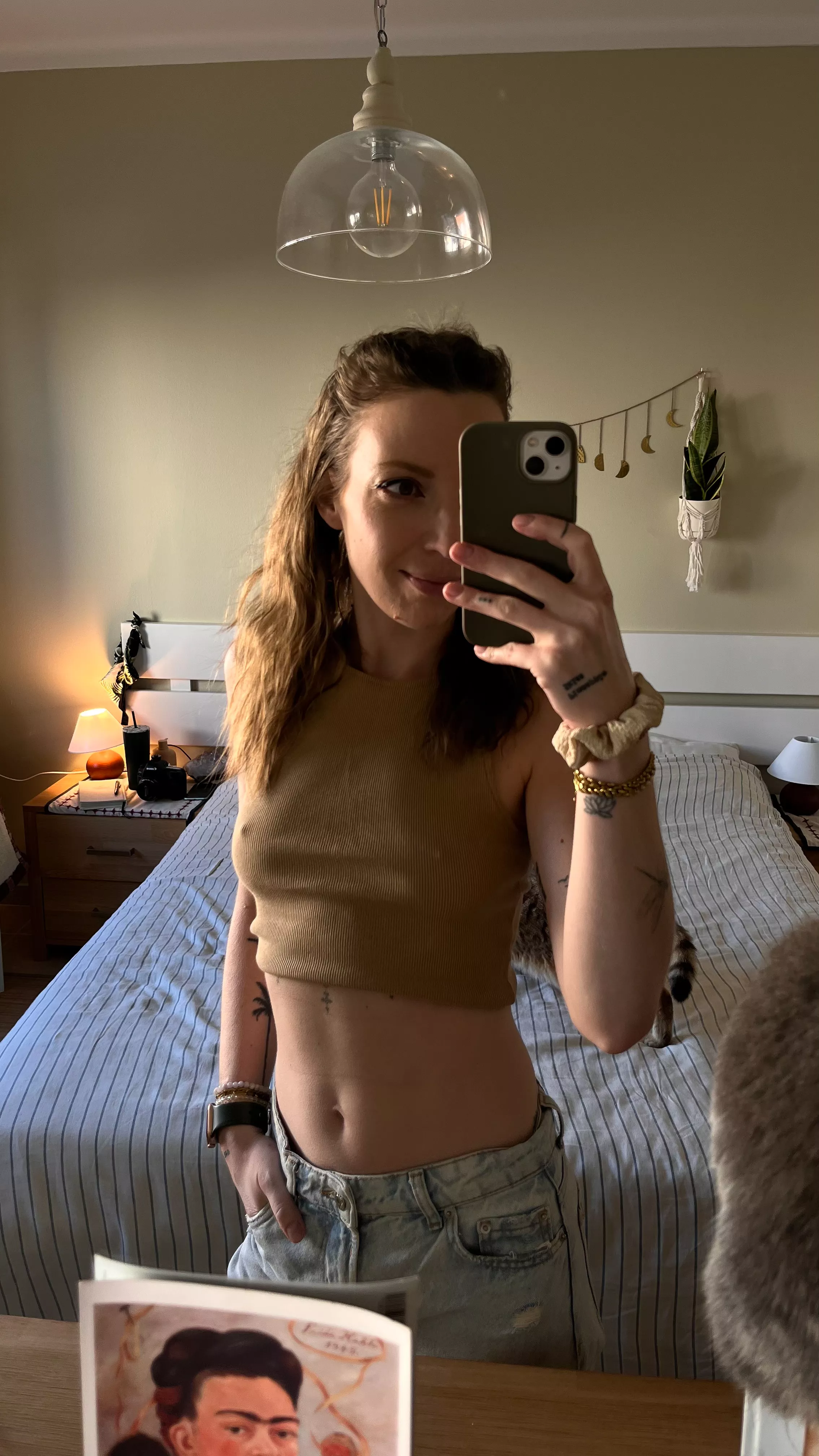 Good weather means crop top and no bra