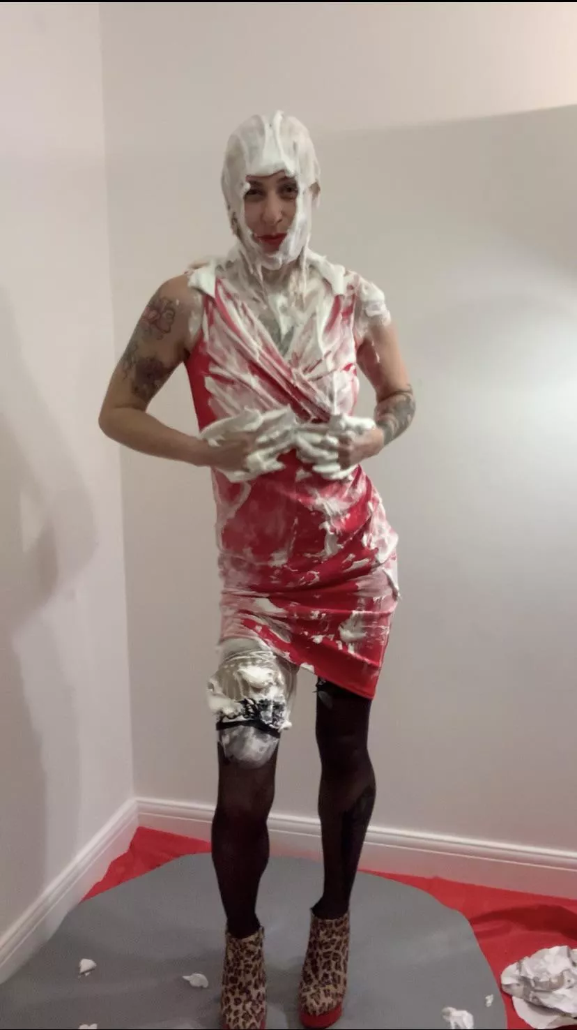 In the middle of trashing my little red dress with 8 foam pies!