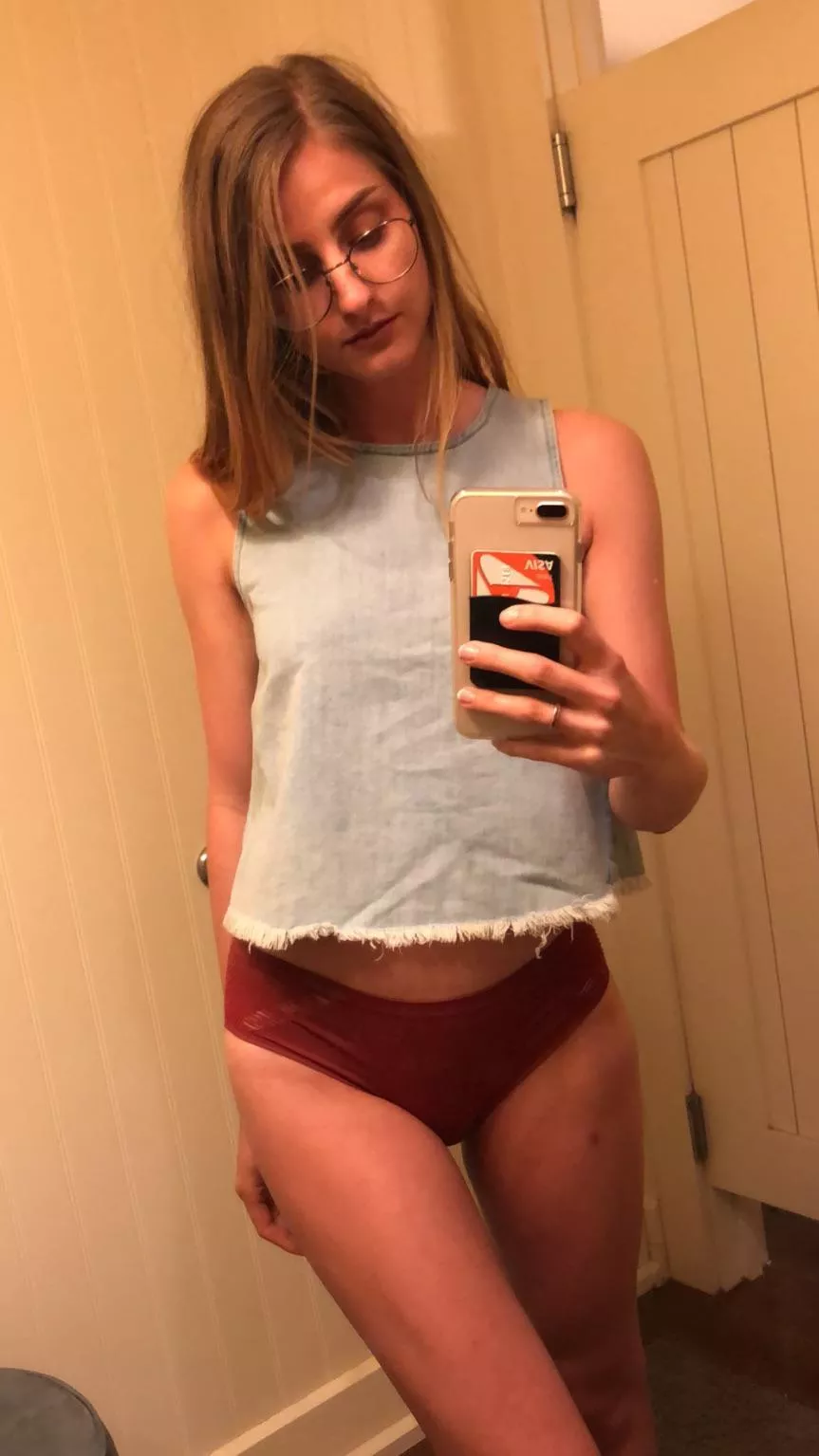 Fitting room selfie in my glasses & no pants