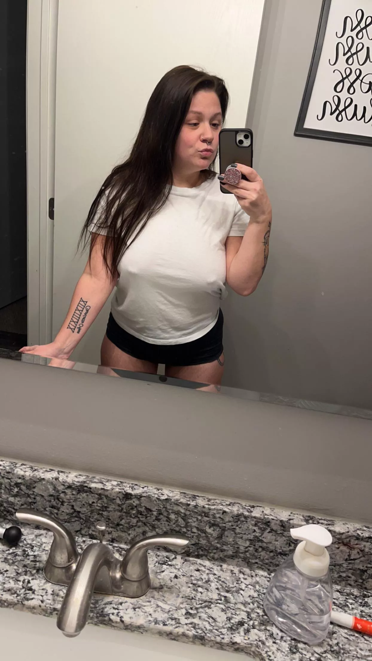 No make up, white tshirs, tattoos, booty shorts and pierced nips.. what more could you want? A milf? That’s me baby