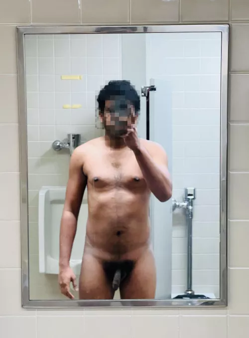 Getting completely naked in a public restroom - moments before I got aroused