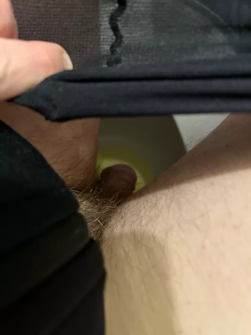 Peeing with hose on. . .