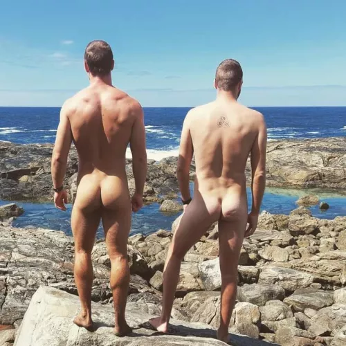 Naked butts at the beach