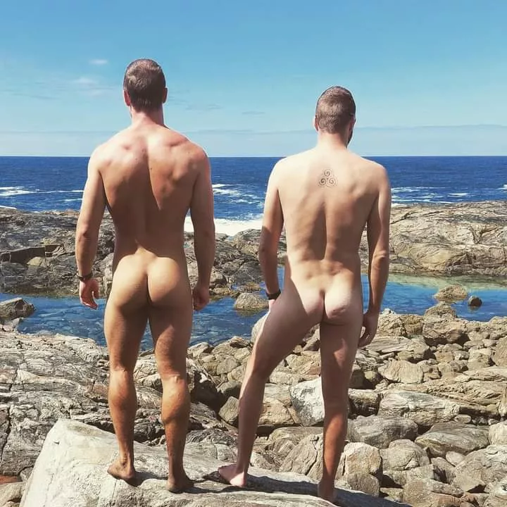 Naked butts at the beach