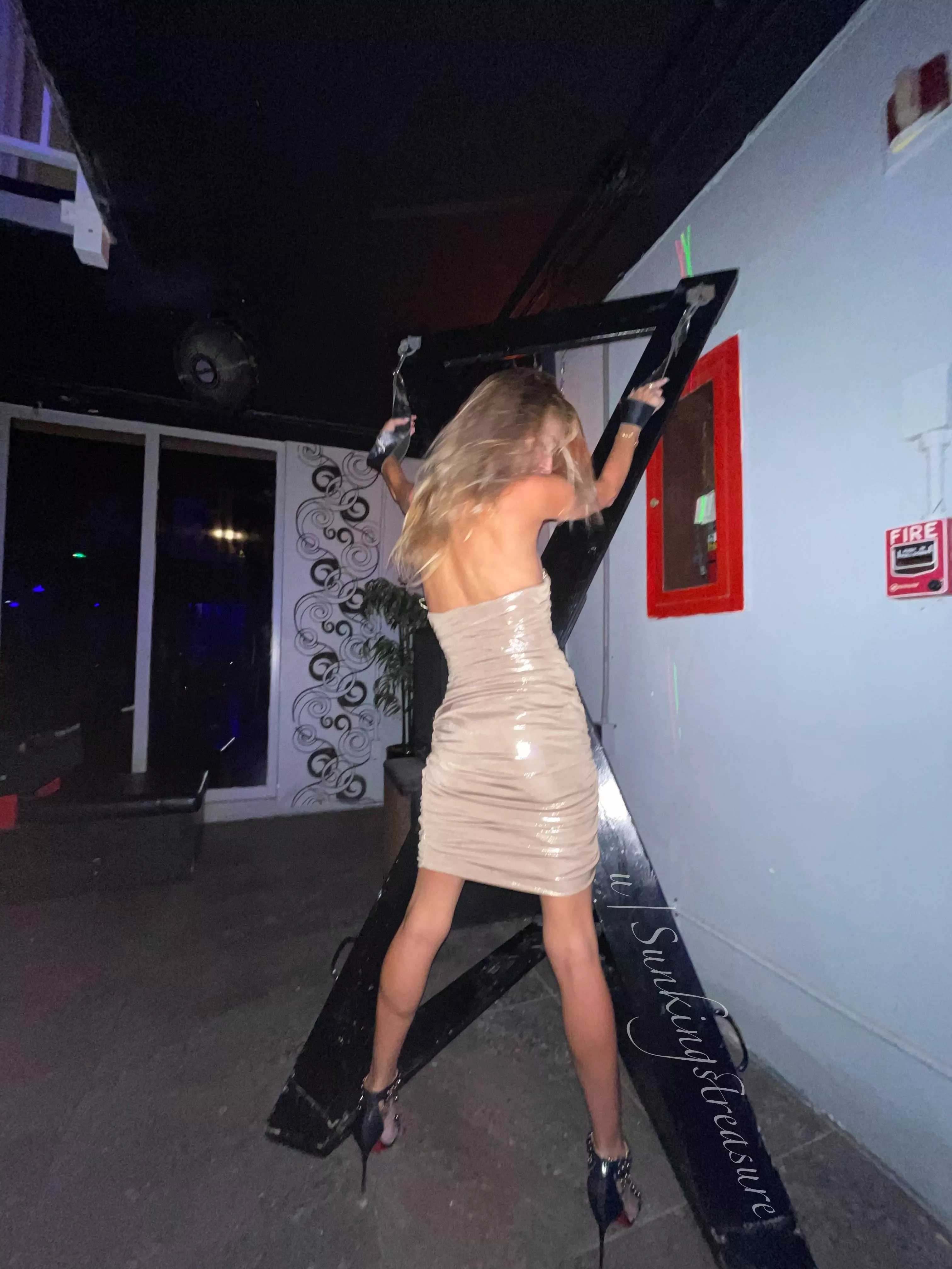 The weekend after our marriage, my husband took me to a [F]etish party at a naked hotel where he showed me this cross and now I want one for the bedroom! Where can we find one that fits me and has a little shelf for me to stand on in by red soles? :)