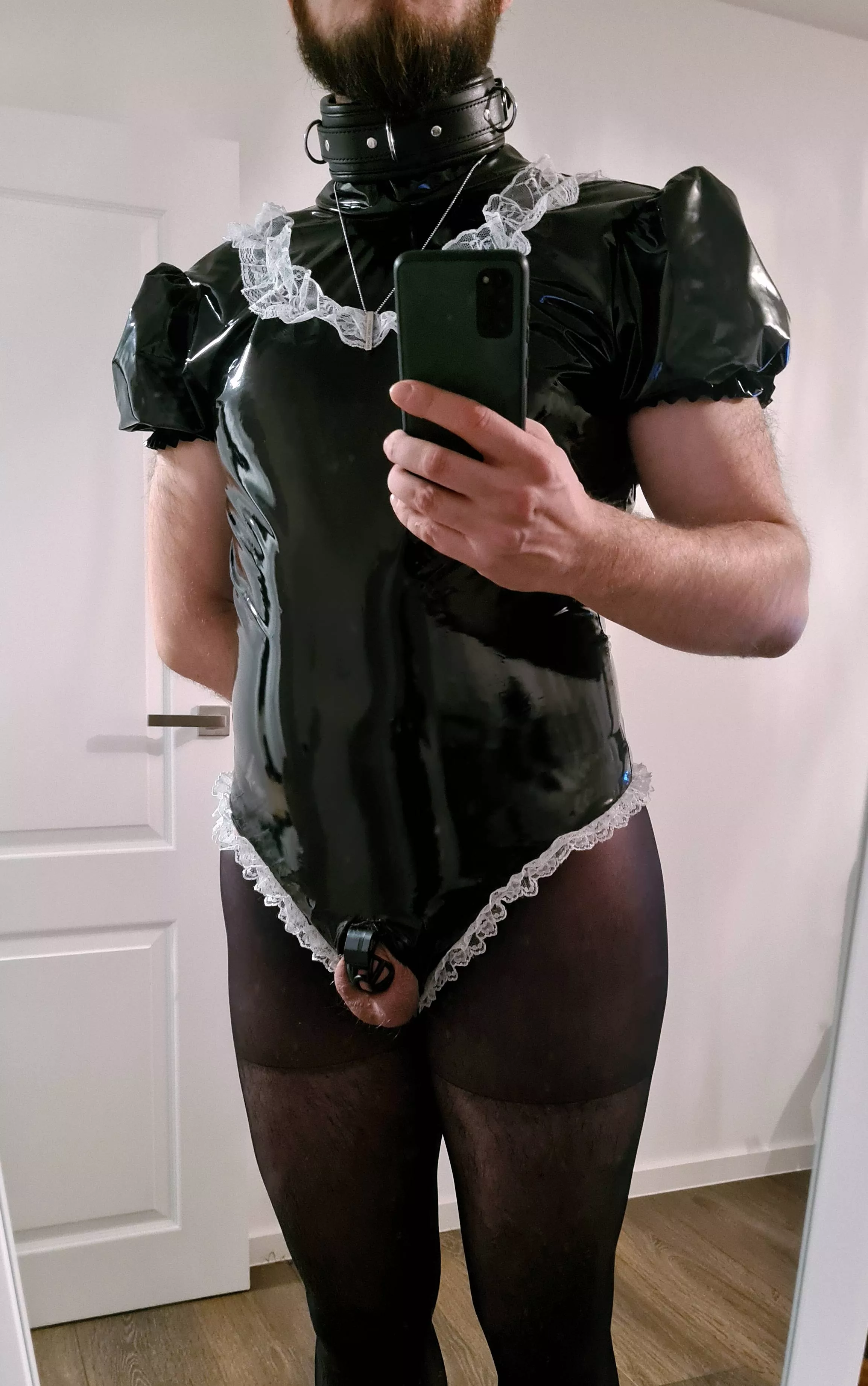 At first she bought me a collar. Then she asked me to wear a chastity cage. And now she got me this outfit. I think she is slowly brainwashing me into becoming her own personal sissy slave!