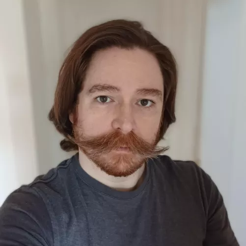 Looking a bit scruffy, but the mustache has really grown out!
