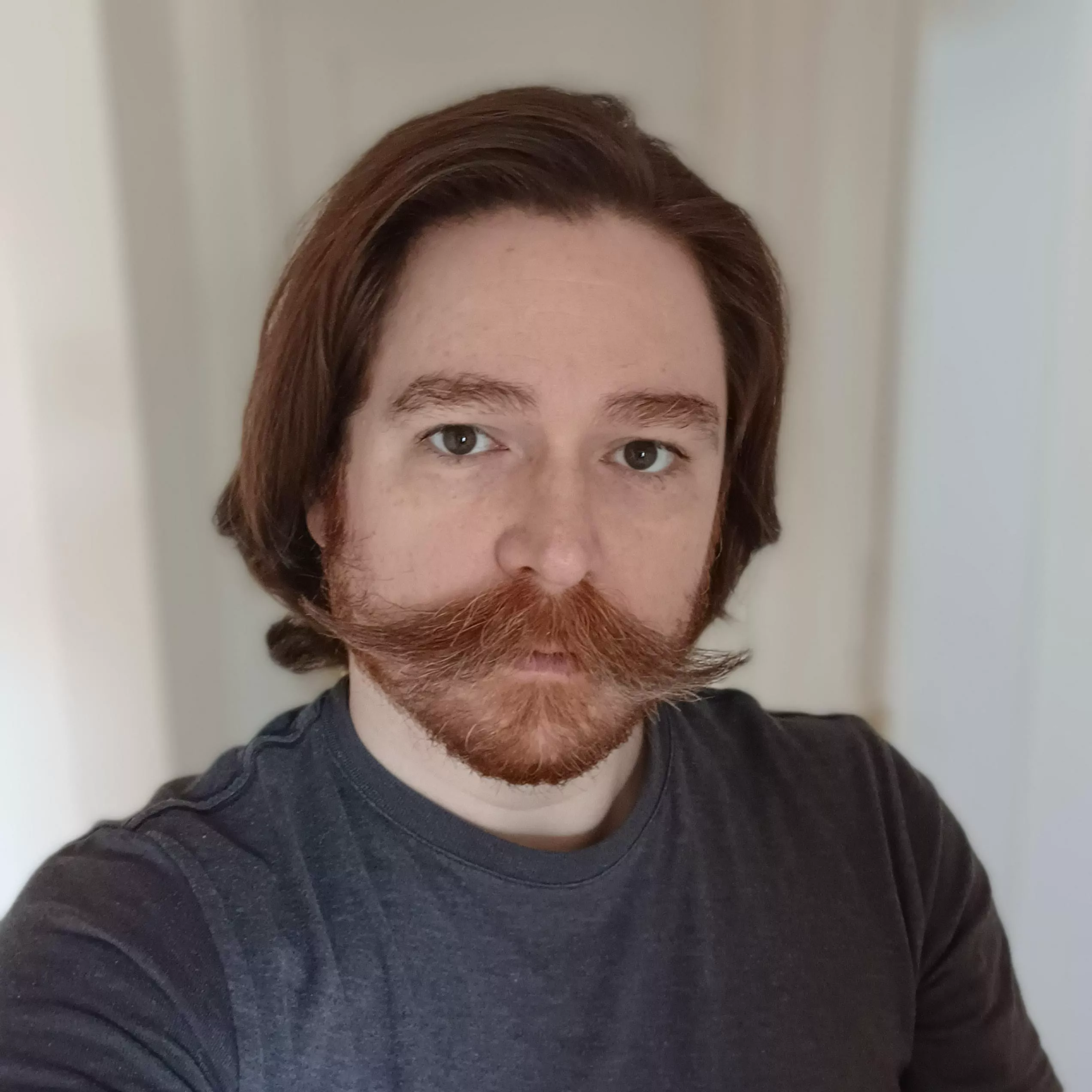 Looking a bit scruffy, but the mustache has really grown out!