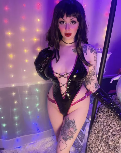 Red lips on black latex