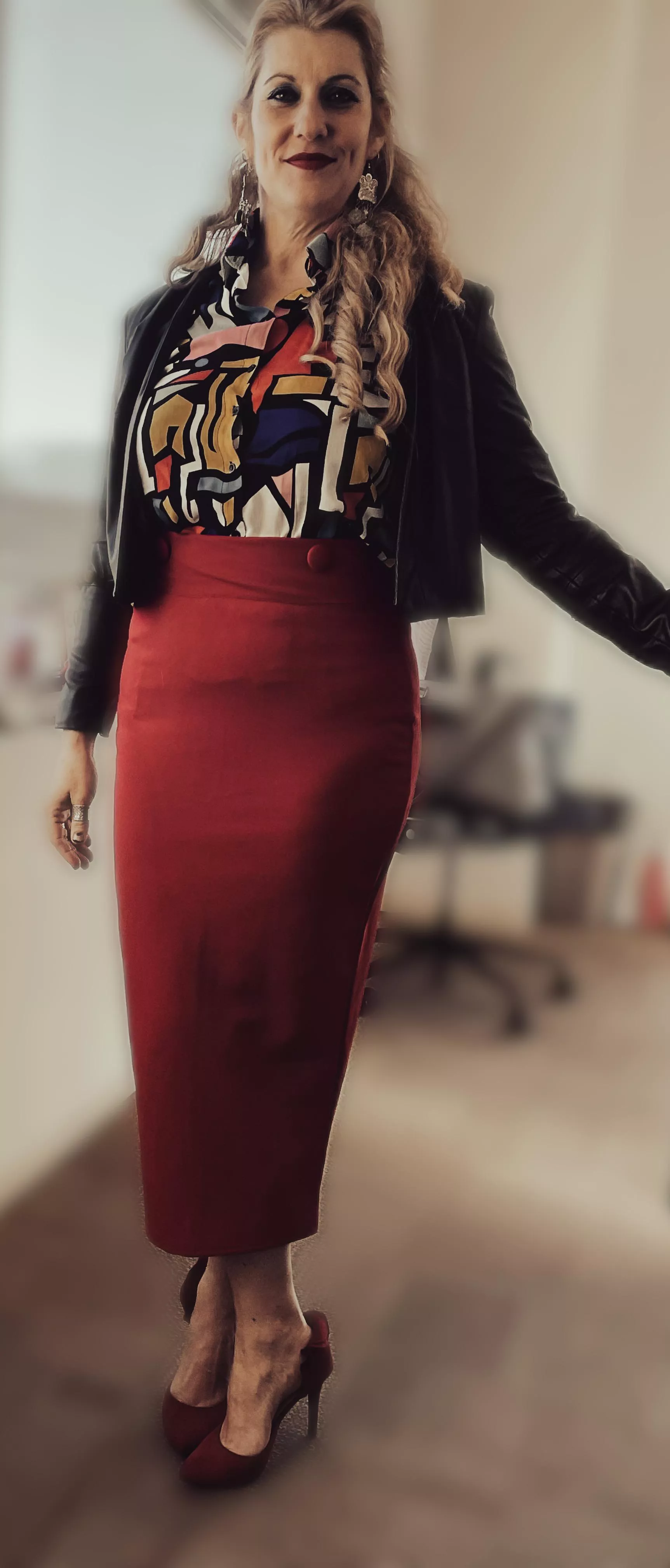 The Red Queen. New pumps with ruffles by Christian Siriano that I am in love with.