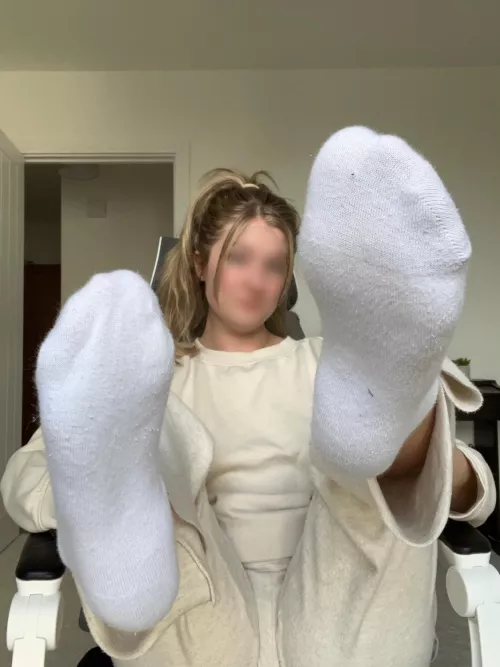 What do you think the size of the feet in these white socks are? [F]