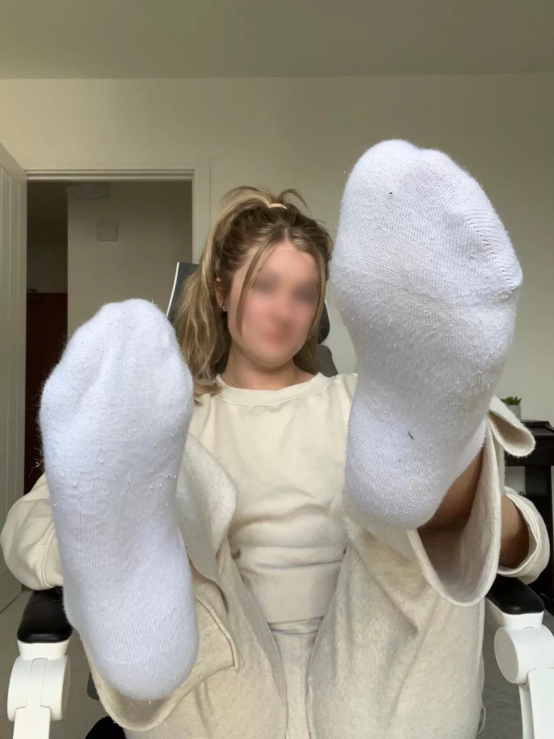 What do you think the size of the feet in these white socks are? [F]