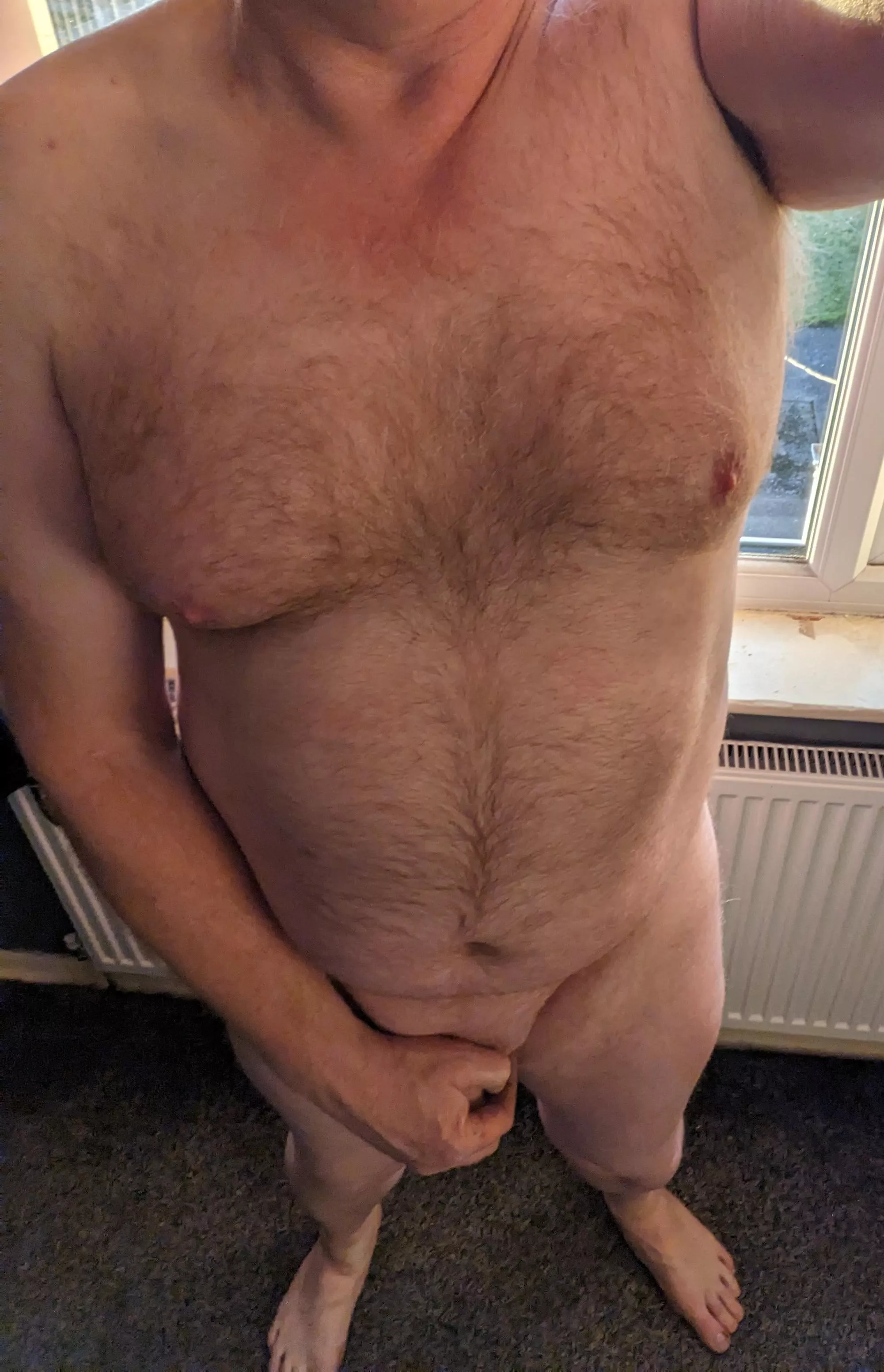 Naughty pic in front of the window