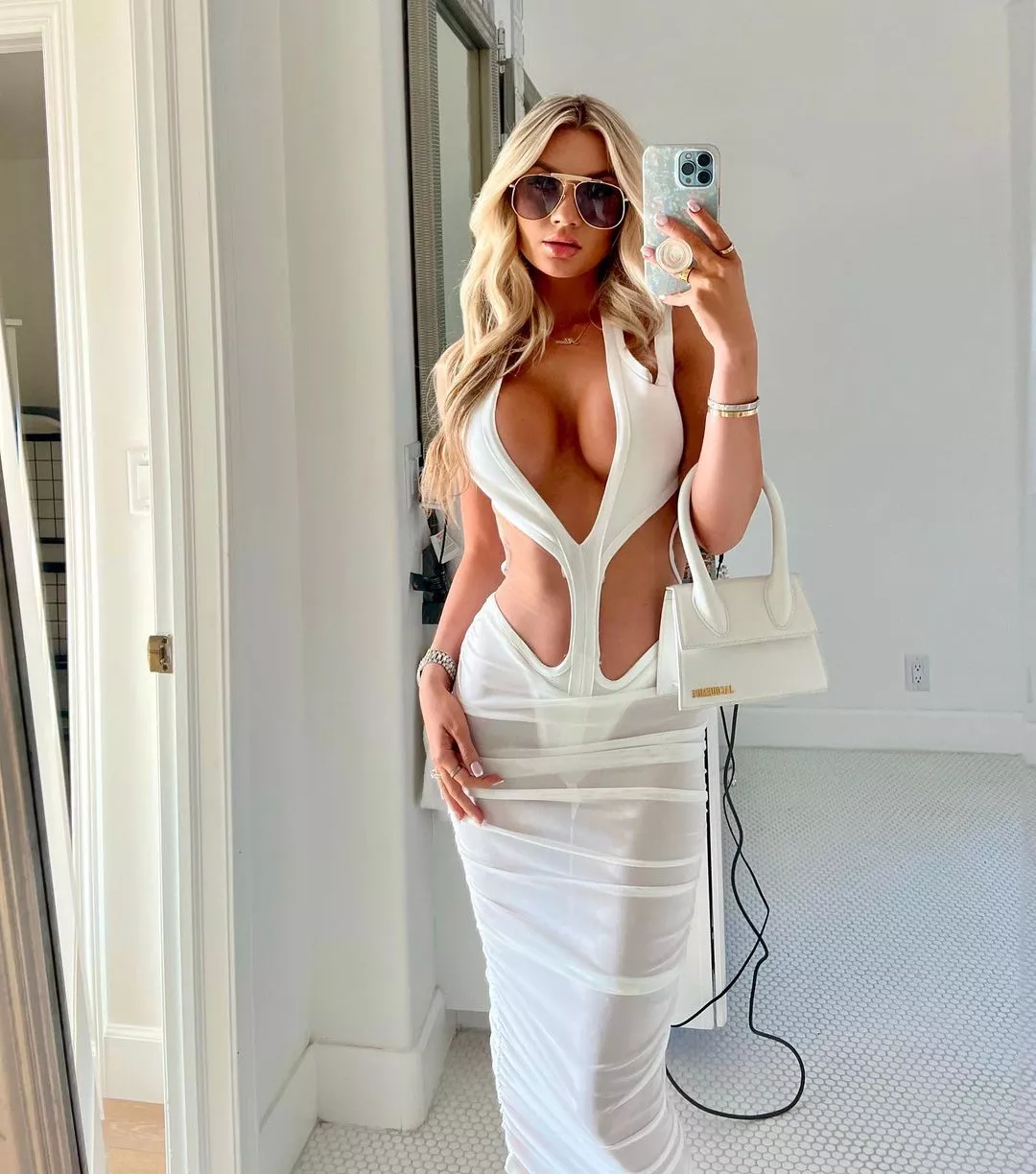 white dress with a lot of cleavage