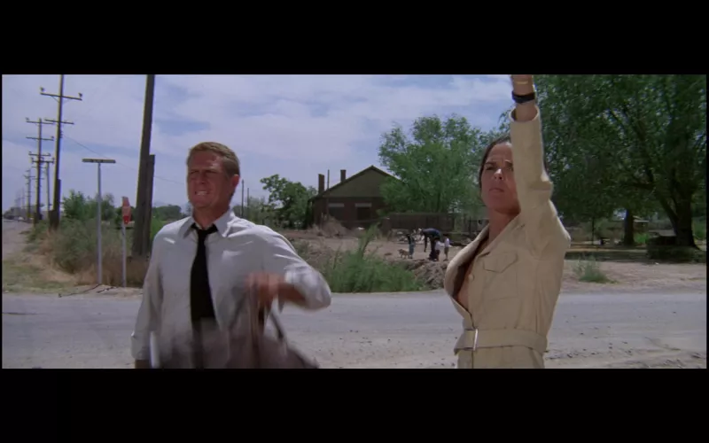 From some Steve McQueen movie, a fine nipple slip.