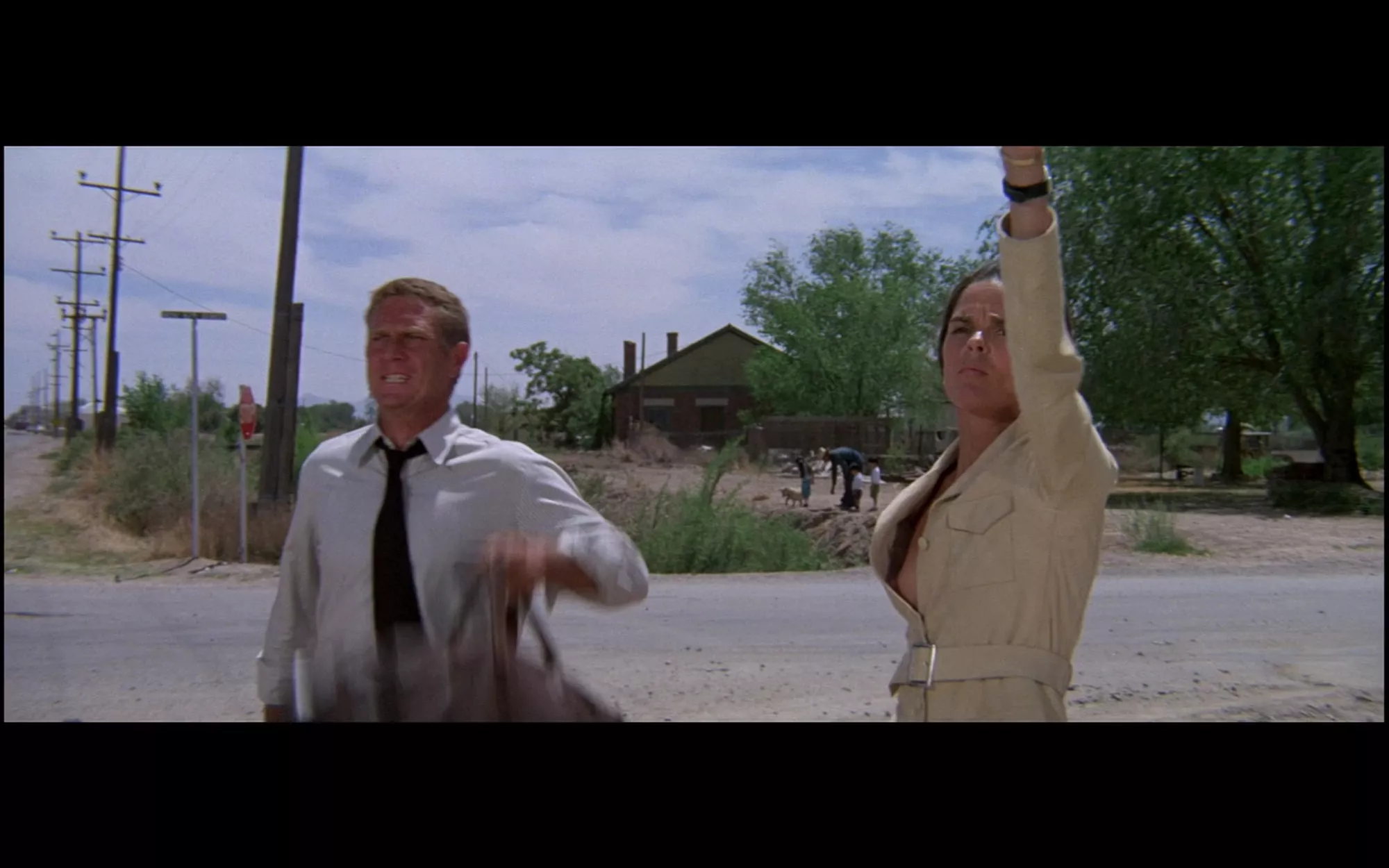 From some Steve McQueen movie, a fine nipple slip.