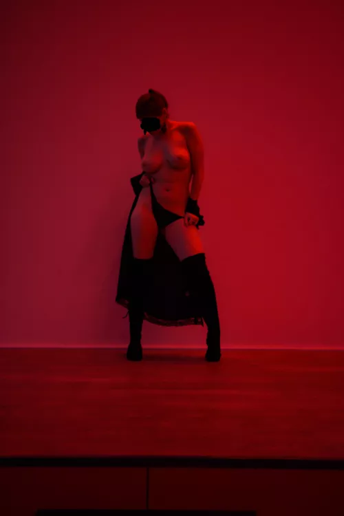 On stage, red background (f)