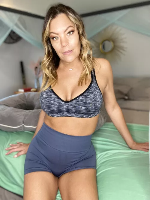 Sexy MILF with natural boobs