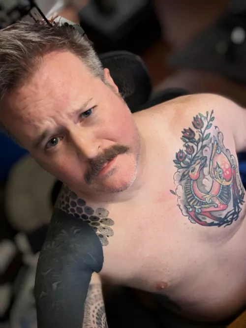 tattoos and a stache too
