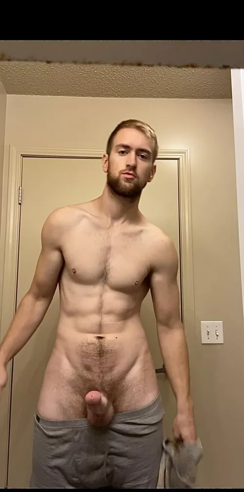 Big drunk removes clothing in bathroom