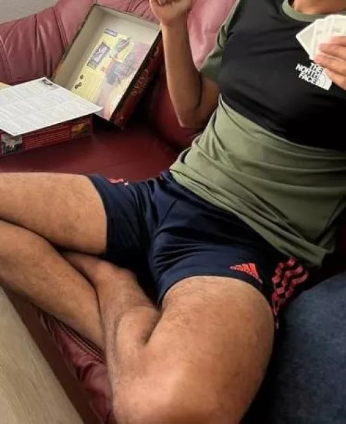 casually playing cards. why is everyone starting and licking their lips?