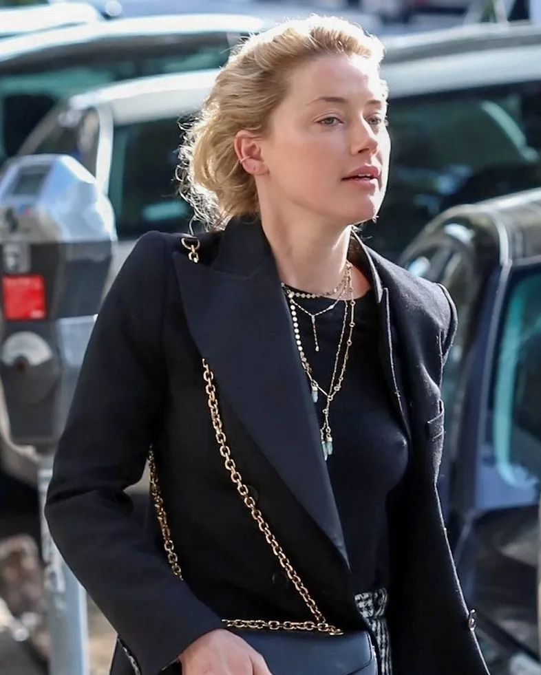 Single pokie slipping out of her jacket