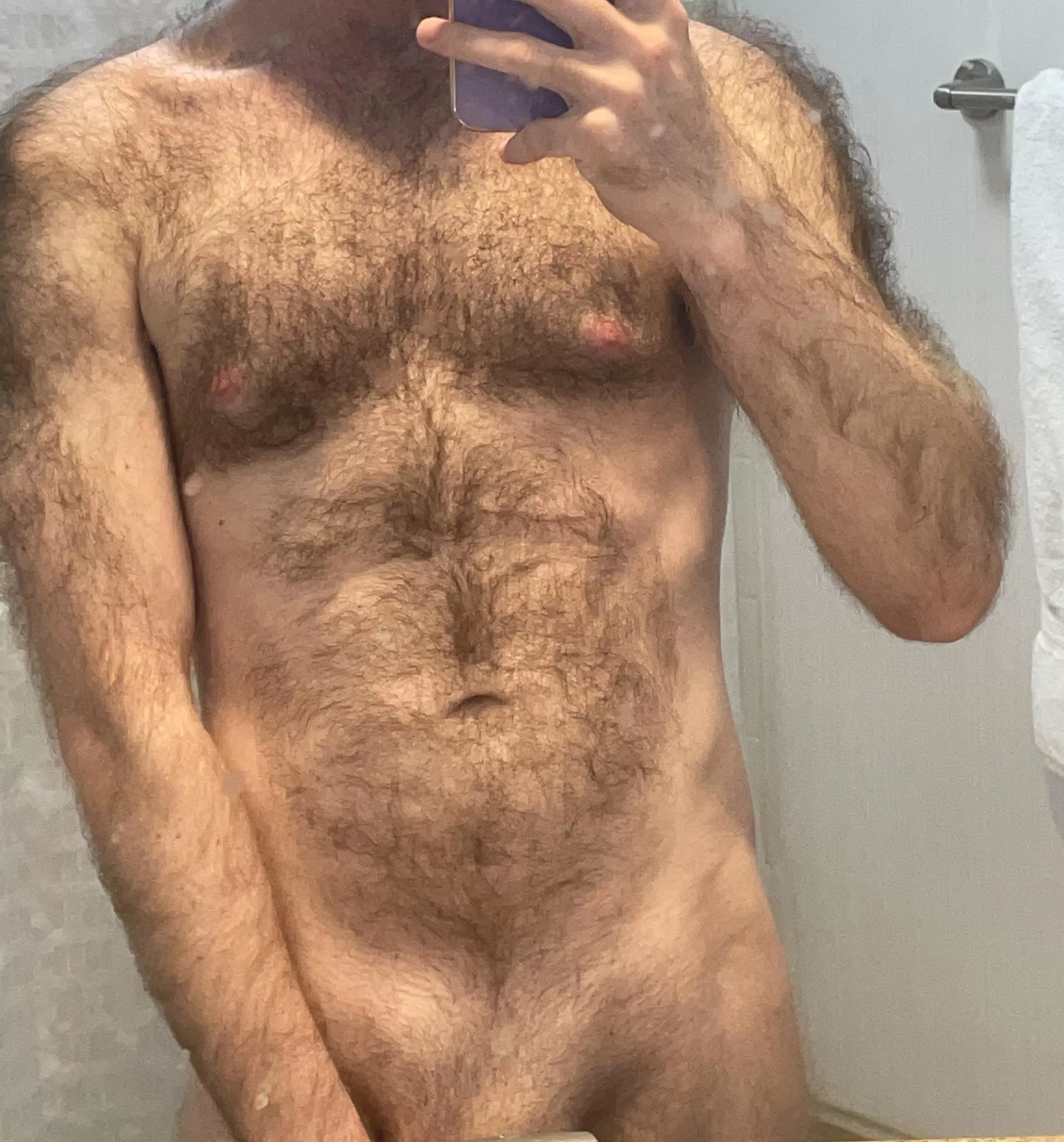 trimmed up below but chest is still plenty hairy