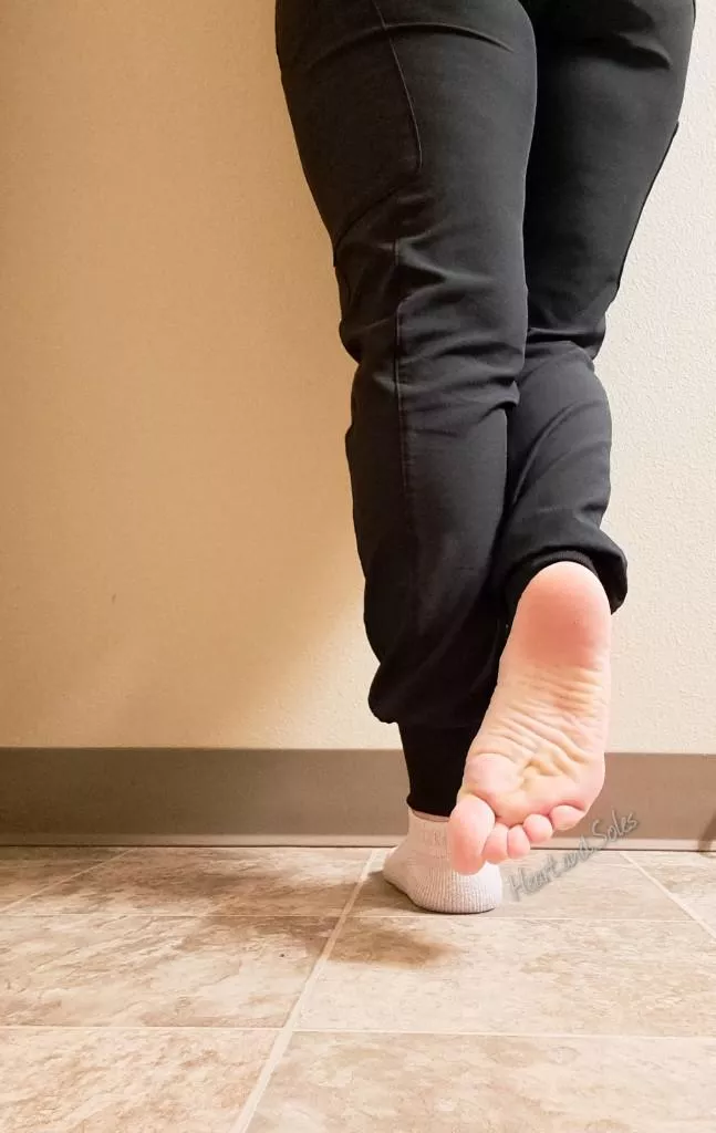 naughty nurse at work sneaking feet pics