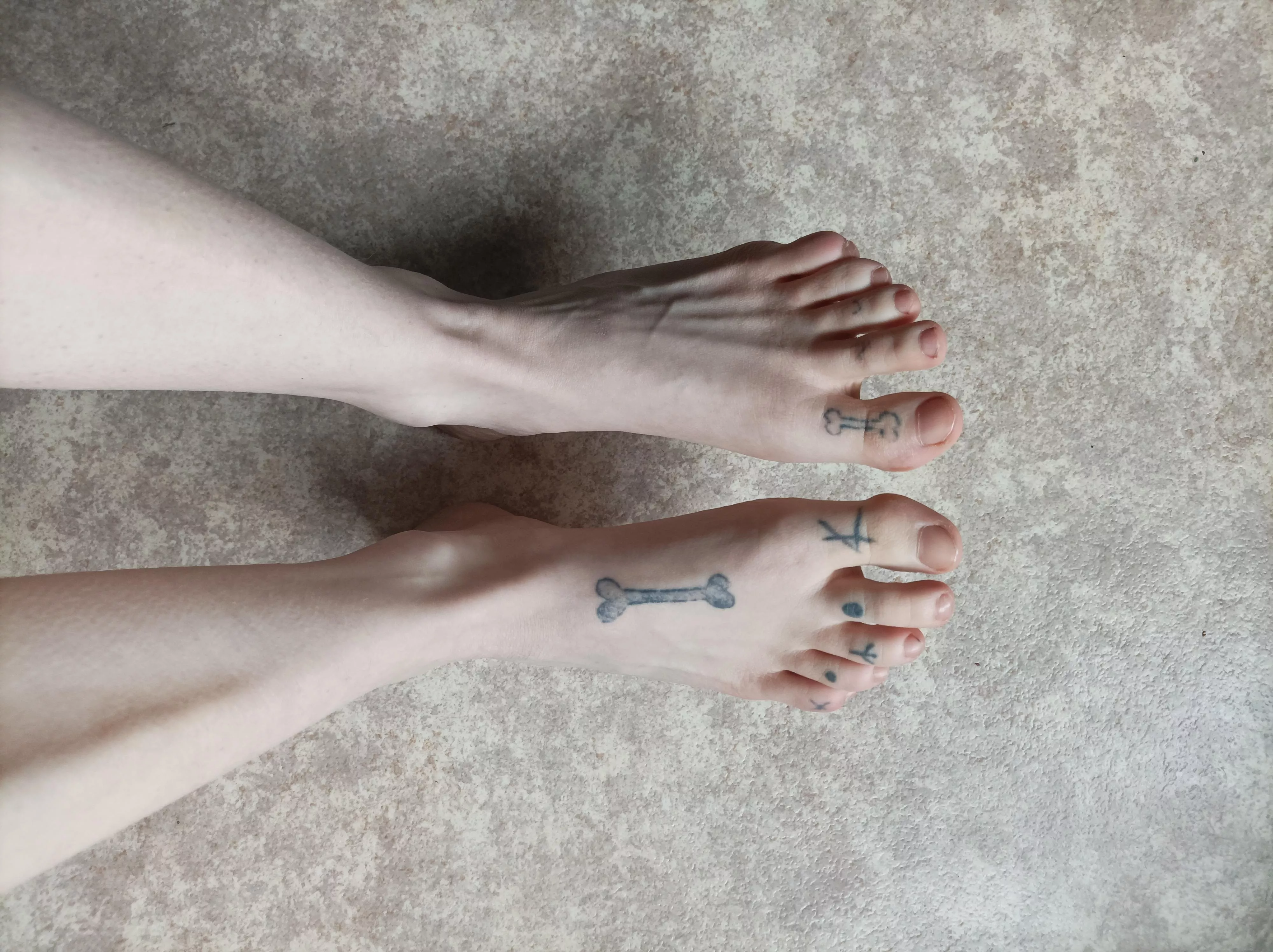 tattooed feet anyone?
